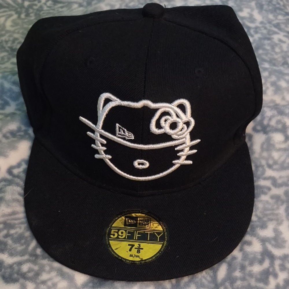 New Era Black Hat with White Hello Kitty Design